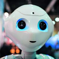 KY93BJ Lucerne, Switzerland - 2 Dec 2017: Humanoid robot Pepper, demonstrated at the Swiss Handicap fair in Lucerne, Switzerland.