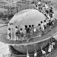 Children at a school in France have a huge globe which they can walk around on a spiral staircase.